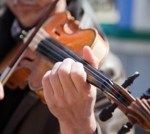 musician playing violin music