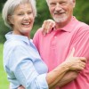 Happy older couple after treating sleep apnea